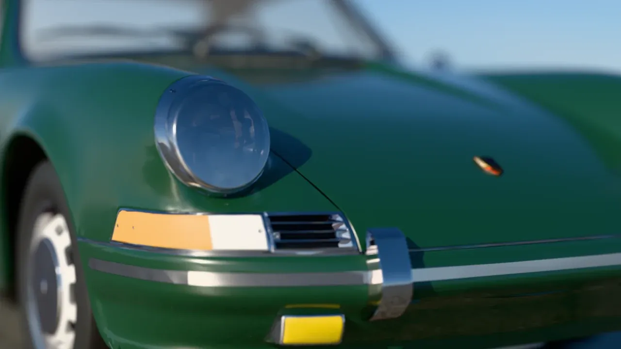 Close-up of the chrome headlight and bumper of the 1964 911 in daylight