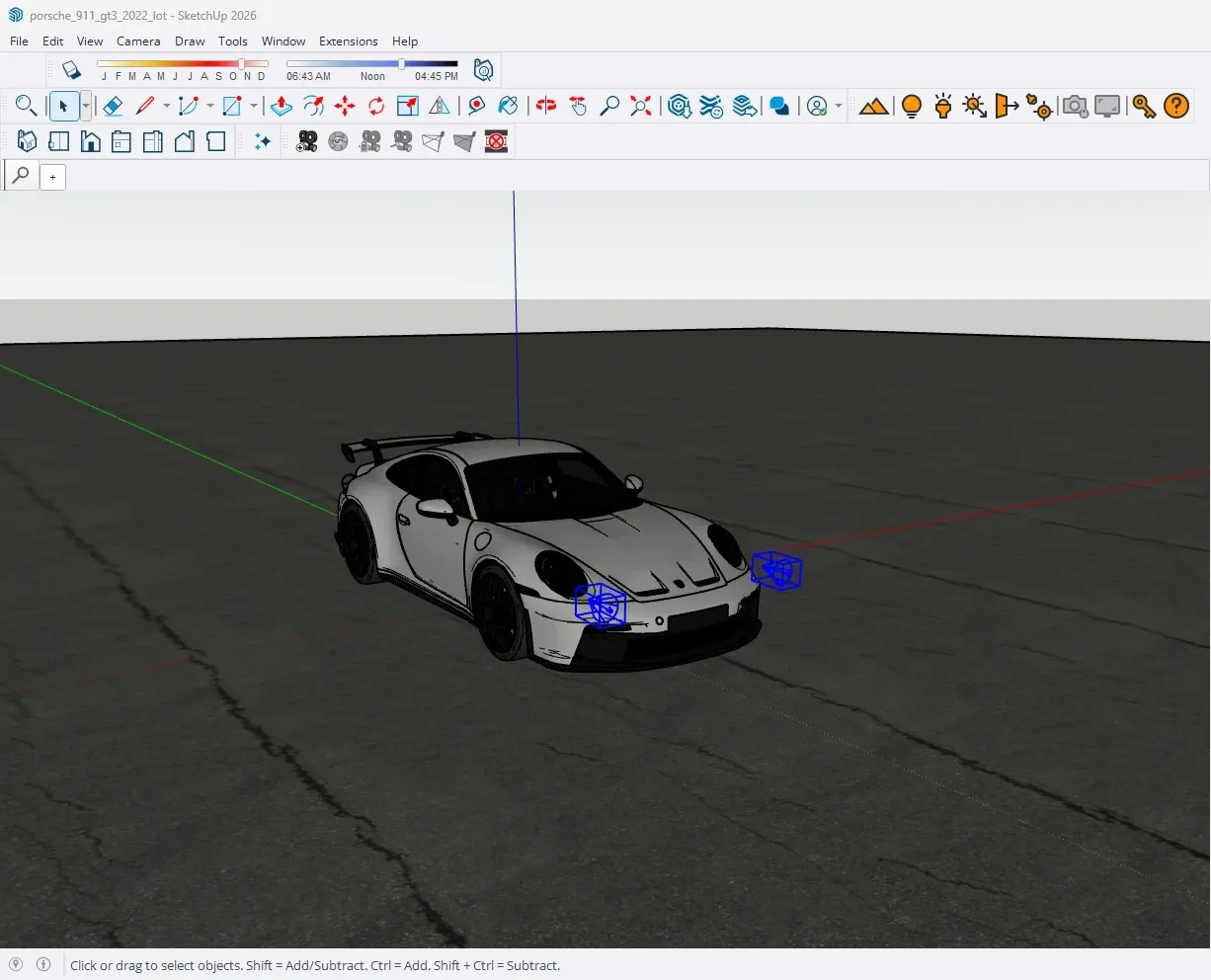 The lot set in SketchUp: the GT3 on the asphalt with a spotlight component selected in front of each headlight