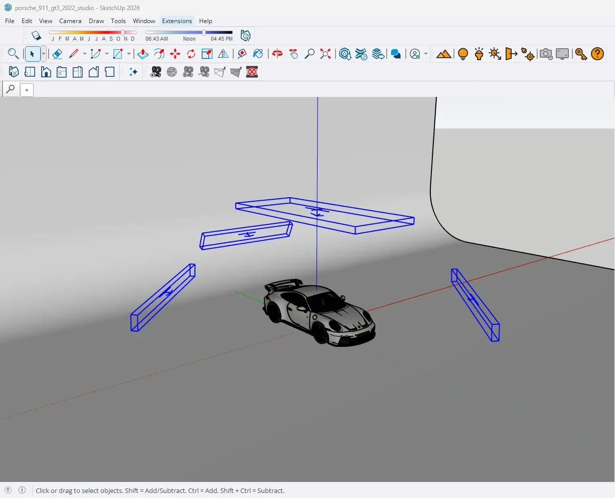 The studio set in SketchUp: the car on the cyclorama, the softbox above it, the two strips beside it and the rim light behind it, all selected in blue